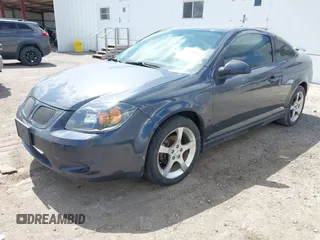 2009 Pontiac G5 GT with VIN 1G2AT18H797147694, listed as a IAAI auction lot 41996093 with 164,747 mi miles. Bid and sale history available at carsss.com. Image 2.
