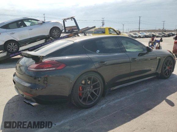2014 Porsche Panamera Turbo z VIN WP0AC2A72EL073234, wystawiony jako Copart lot #65813464 z przebiegiem 83 918 mil mil oraz Szkoda całkowita • Salvage title. Historia ofert i sprzedaży dostępna na DreamBid. Obrazek 3.