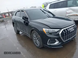 2021 Audi Q3 Premium with VIN WA1AUCF31M1131914, listed as a IAAI auction lot 41571543 with 35,477 mi miles and . Bid and sale history available at DreamBid. Image 1.