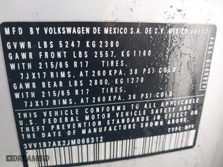 2018 Volkswagen Tiguan S with VIN 3VV1B7AX2JM066312, listed as a IAAI auction lot 41641390 with 133,000 mi miles. Bid and sale history available at carsss.com. Image 9.
