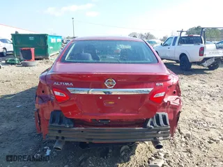 2016 Nissan Altima 2.5 SL with VIN 1N4AL3APXGC281084, listed as a IAAI auction lot 41528669 with 59,201 mi miles. Bid and sale history available at carsss.com. Image 17.