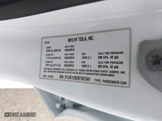 2019 Tesla Model 3 Long Range with VIN 5YJ3E1EB2KF361541, listed as a IAAI auction lot 41859373 with 54,664 mi miles. Bid and sale history available at carsss.com. Image 9.