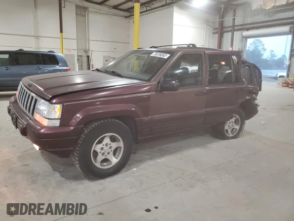 1996 Jeep Grand Cherokee Laredo with VIN 1J4EX58S5TC133225, listed as a Copart auction lot 49132214 with 233,886 mi miles and Non Repairable. Bid and sale history available at carsss.com. Image 1.