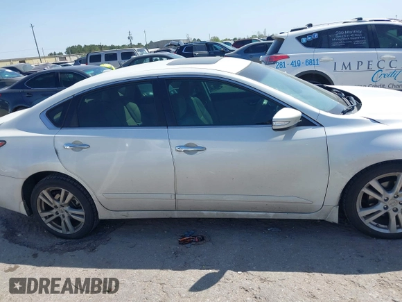 2014 Nissan Altima SL with VIN 1N4BL3AP6EC421665, listed as a IAAI auction lot 41858814 with 199,040 mi miles and . Bid and sale history available at DreamBid. Image 13.