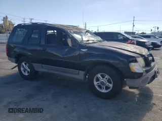 2003 Ford Explorer Sport XLS z VIN 1FMYU60E93UC12832, wystawiony jako Copart lot #71596394 z przebiegiem 197 215 mil mil oraz Szkody całkowita. Historia ofert i sprzedaży dostępna na DreamBid. Obrazek 4.