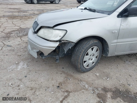 2002 Mitsubishi Lancer ES with VIN JA3AJ26E62U043039, listed as a IAAI auction lot 41600217 with 141,217 mi miles. Bid and sale history available at carsss.com. Image 6.