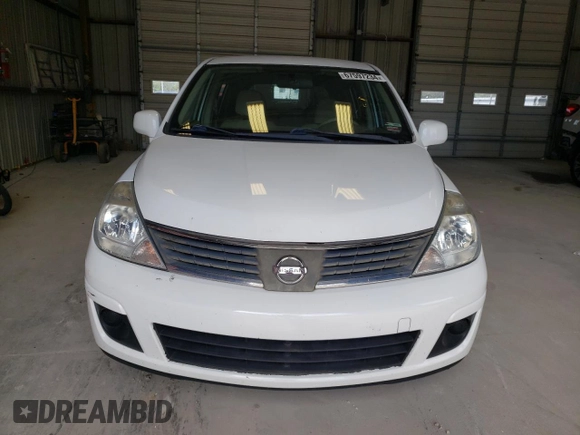 2009 Nissan Versa 1.8 S with VIN 3N1BC13E09L496658, listed as a Copart auction lot 67597234 with 125,854 mi miles and Salvage Title. Bid and sale history available at carsss.com. Image 5.