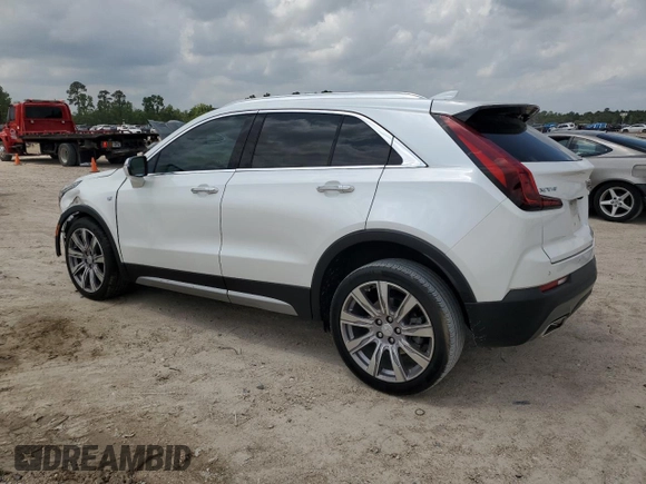 2021 Cadillac XT4 FWD Premium Luxury with VIN 1GYFZCR44MF080763, listed as a Copart auction lot 54059525 with 46,319 mi miles and Salvage Title. Bid and sale history available at carsss.com. Image 2.
