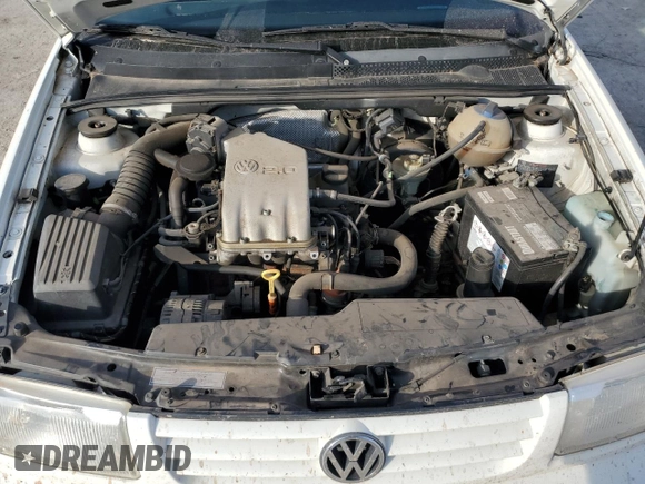 1998 Volkswagen Jetta z VIN 3VWVA81H4WM127083, wystawiony jako Copart lot #88396925 z przebiegiem 192 757 mil mil oraz Szkoda całkowita • Salvage title. Historia ofert i sprzedaży dostępna na DreamBid. Obrazek 11.