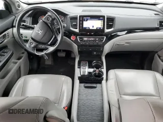 2017 Honda Pilot Touring z VIN 5FNYF6H92HB006855, wystawiony jako Copart lot #53650655 z przebiegiem 130 732 mil mil oraz Szkoda całkowita • Salvage title. Historia ofert i sprzedaży dostępna na DreamBid. Obrazek 8.