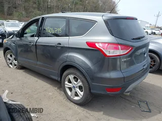 2015 Ford Escape SE with VIN 1FMCU9GX5FUC52980, listed as a IAAI auction lot 42106795 with Not Provided miles and . Bid and sale history available at DreamBid. Image 3.