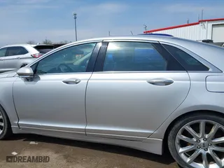 2016 Lincoln MKZ with VIN 3LN6L2G90GR625733, listed as a IAAI auction lot 41990706 with 104,962 mi miles. Bid and sale history available at carsss.com. Image 14.