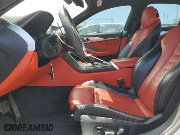 2021 BMW 8 Series M850i with VIN WBAGV8C04MCF56486, listed as a Copart auction lot 55991015 with 60,249 mi miles and Salvage title. Bid and sale history available at DreamBid. Image 7.