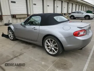 2009 Mazda MX-5 Miata Grand Touring z VIN JM1NC25F090202047, wystawiony jako Copart lot #55810505 z przebiegiem 91 618 mil mil oraz Szkody całkowita. Historia ofert i sprzedaży dostępna na DreamBid. Obrazek 2.