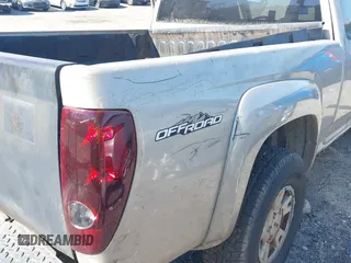 2005 GMC Canyon SLE Z71 with VIN 1GTDS196458115296, listed as a IAAI auction lot 42053344 with 290,209 mi miles. Bid and sale history available at carsss.com. Image 12.