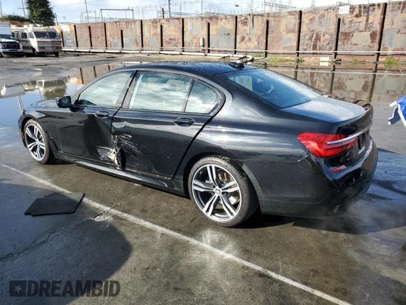 2017 BMW 7 Series 740i with VIN WBA7E2C59HG739788, listed as a Copart auction lot 48073105 with 36,274 mi miles and Salvage Title. Bid and sale history available at carsss.com. Image 2.