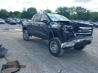 2019 GMC Sierra 1500 SLE z VIN 1GTU9BED6KZ356269, wystawiony jako IAAI lot #42380272 z przebiegiem 77 424 mil mil oraz . Historia ofert i sprzedaży dostępna na DreamBid. Obrazek 1.