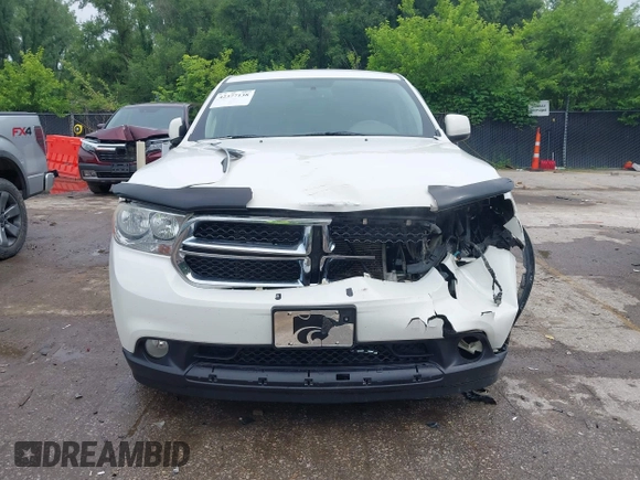 2012 Dodge Durango SXT with VIN 1C4RDJAG8CC336267, listed as a IAAI auction lot 42377138 with 179,555 mi miles and . Bid and sale history available at DreamBid. Image 12.