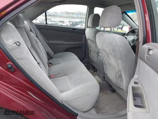 2004 Toyota Camry LE with VIN 4T1BE32K84U307551, listed as a IAAI auction lot 42054571 with 115,513 mi miles. Bid and sale history available at carsss.com. Image 8.