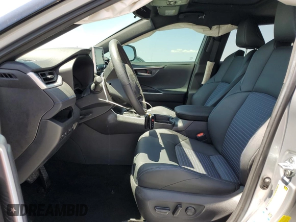 2021 Toyota RAV4 Hybrid XSE with VIN 2T3E6RFV4MW017302, listed as a Copart auction lot 57397275 with 15,544 mi miles and Salvage title. Bid and sale history available at DreamBid. Image 7.