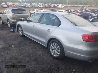 2012 Volkswagen Jetta SE with VIN 3VWDX7AJ5CM316960, listed as a IAAI auction lot 42134332 with 108,194 mi miles and . Bid and sale history available at DreamBid. Image 3.