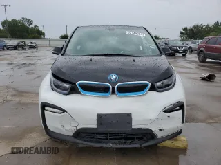 2020 BMW i3 z VIN WBY8P4C06L7G85006, wystawiony jako Copart lot #62149924 z przebiegiem Nie podano mil oraz Szkoda całkowita • Salvage title. Historia ofert i sprzedaży dostępna na DreamBid. Obrazek 5.