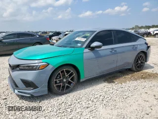 2023 Honda Civic Sport Touring с VIN 19XFL1H83PE015952, выставлен на аукционе Copart как лот 59163475 с пробегом 12 799 миль миль и Списание • Salvage title. История ставок и продаж доступна на DreamBid. Изображение 1.