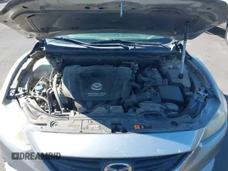 2014 Mazda 6 i Sport with VIN JM1GJ1U61E1151348, listed as a IAAI auction lot 42248173 with 275,764 mi miles and . Bid and sale history available at DreamBid. Image 10.