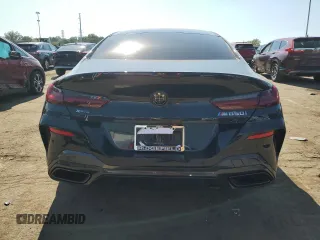 2022 BMW 8 Series M850i z VIN WBAGV8C03NCH58172, wystawiony jako Copart lot #71592504 z przebiegiem 25 854 mil mil oraz Czysty tytuł • Clean title. Historia ofert i sprzedaży dostępna na DreamBid. Obrazek 6.