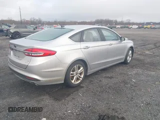 2018 Ford Fusion SE z VIN 3FA6P0HD2JR207865, wystawiony jako IAAI lot #41835895 z przebiegiem 91 069 mil mil oraz . Historia ofert i sprzedaży dostępna na DreamBid. Obrazek 4.