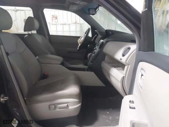 2014 Honda Pilot EX-L with VIN 5FNYF4H51EB009257, listed as a IAAI auction lot 41495426 with 128,231 mi miles. Bid and sale history available at carsss.com. Image 5.