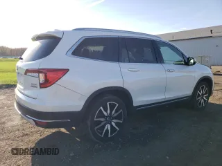 2021 Honda Pilot Elite with VIN 5FNYF6H05MB004870, listed as a Copart auction lot 54119115 with 99,491 mi miles and Salvage title. Bid and sale history available at DreamBid. Image 3.