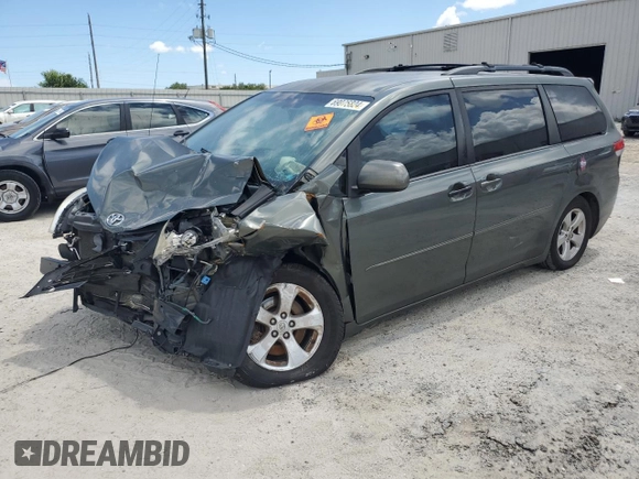 2014 Toyota Sienna LE AAS with VIN 5TDKK3DC5ES423802, listed as a Copart auction lot 69075824 with Not Provided miles and Salvage Title. Bid and sale history available at DreamBid. Image 1.