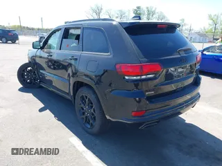 2021 Jeep Grand Cherokee Limited with VIN 1C4RJFBG5MC671721, listed as a IAAI auction lot 42129371 with 23,900 mi miles and . Bid and sale history available at DreamBid. Image 3.