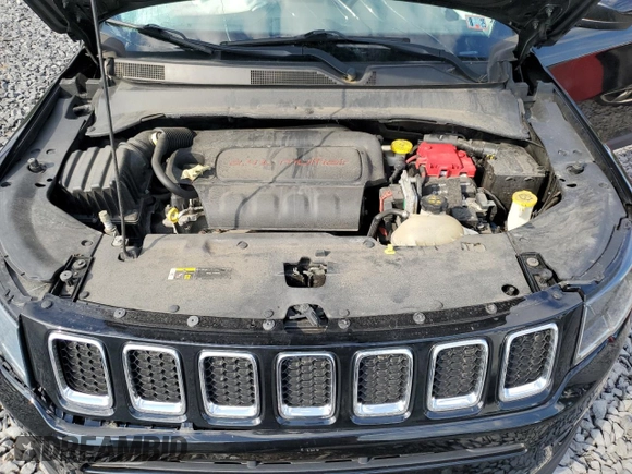 2019 Jeep Compass Latitude z VIN 3C4NJDBB5KT713992, wystawiony jako Copart lot #64503495 z przebiegiem 99 097 mil mil oraz Szkoda całkowita • Salvage title. Historia ofert i sprzedaży dostępna na DreamBid. Obrazek 12.
