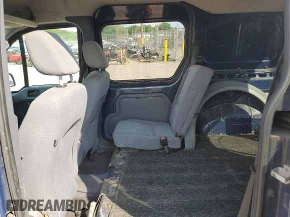 2010 Ford Transit Connect XLT z VIN NM0KS9BN0AT013571, wystawiony jako Copart lot #61586365 z przebiegiem 141 821 mil mil oraz Szkoda całkowita • Salvage title. Historia ofert i sprzedaży dostępna na DreamBid. Obrazek 10.