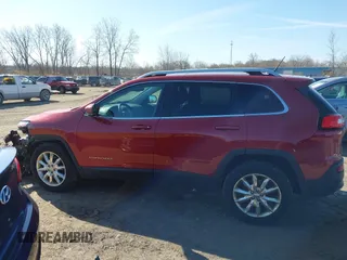 2015 Jeep Cherokee Limited with VIN 1C4PJMDS1FW646135, listed as a IAAI auction lot 41991811 with 123,229 mi miles. Bid and sale history available at carsss.com. Image 14.