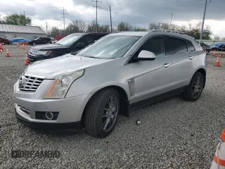 2013 Cadillac SRX Performance Collection z VIN 3GYFNHE3XDS622157, wystawiony jako Copart lot #53475675 z przebiegiem 95 253 mil mil oraz Szkoda całkowita • Salvage title. Historia ofert i sprzedaży dostępna na DreamBid. Obrazek 1.