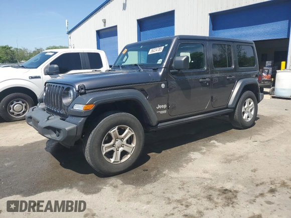 2020 Jeep Wrangler Unlimited Black and Tan with VIN 1C4HJXDGXLW221705, listed as a Copart auction lot 56224785 with 82,360 mi miles and Salvage title. Bid and sale history available at DreamBid. Image 1.