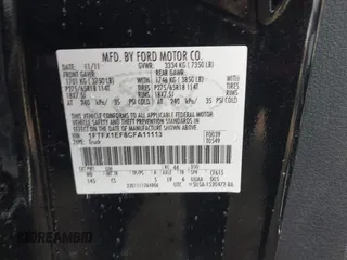 2012 Ford F-150 XL with VIN 1FTFX1EF8CFA11113, listed as a IAAI auction lot 41882879 with 145,253 mi miles. Bid and sale history available at carsss.com. Image 9.