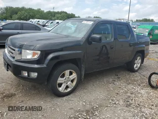 2011 Honda Ridgeline RTL z VIN 5FPYK1F56BB003227, wystawiony jako Copart lot #66809995 z przebiegiem 127 695 mil mil oraz Czysty tytuł • Clean title. Historia ofert i sprzedaży dostępna na DreamBid. Obrazek 1.