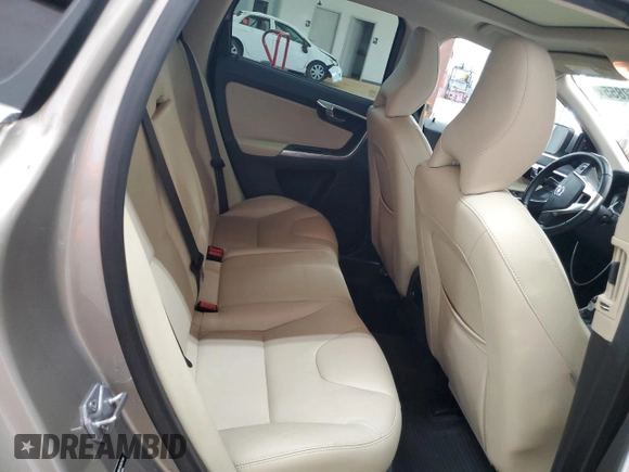 2016 Volvo XC60 T5 Drive-E Premier z VIN YV440MDKXG2857510, wystawiony jako Copart lot #56482855 z przebiegiem 104 878 mil mil oraz Szkoda całkowita • Salvage title. Historia ofert i sprzedaży dostępna na DreamBid. Obrazek 11.