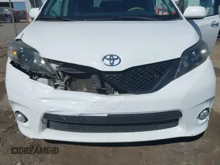 2014 Toyota Sienna SE with VIN 5TDXK3DC0ES477207, listed as a IAAI auction lot 41624619 with 213,881 mi miles and . Bid and sale history available at DreamBid. Image 6.
