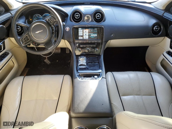 2014 Jaguar XJ with VIN SAJWJ2GD6E8V73491, listed as a Copart auction lot 42472345 with 68,747 mi miles and Salvage Title. Bid and sale history available at carsss.com. Image 8.