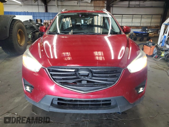 2016 Mazda CX-5 Grand Touring with VIN JM3KE4DY1G0669316, listed as a Copart auction lot 79961554 with 117,454 mi miles and Salvage Title. Bid and sale history available at carsss.com. Image 5.