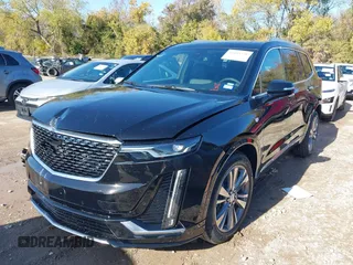 2025 Cadillac XT6 FWD Premium Luxury with VIN 1GYKPCRS1SZ118772, listed as a IAAI auction lot 41048190 with 131 mi miles. Bid and sale history available at carsss.com. Image 17.