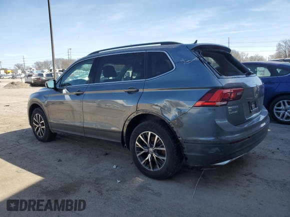 2019 Volkswagen Tiguan SE with VIN 3VV2B7AX5KM024450, listed as a Copart auction lot 52421675 with 132,697 mi miles and Salvage Title. Bid and sale history available at DreamBid. Image 2.