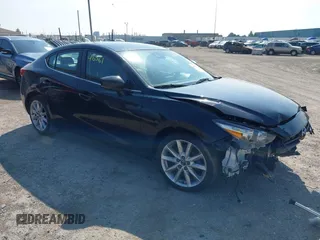 2017 Mazda 3 Touring with VIN 3MZBN1V71HM128596, listed as a IAAI auction lot 42646561 with 181,999 mi miles and . Bid and sale history available at DreamBid. Image 1.