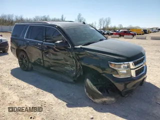 2015 Chevrolet Tahoe LT with VIN 1GNSCBKC0FR193894, listed as a Copart auction lot 49700495 with 179,127 mi miles and Salvage Title. Bid and sale history available at DreamBid. Image 4.