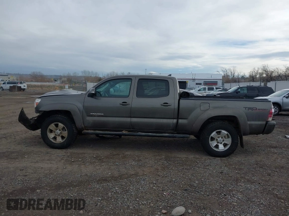 2014 Toyota Tacoma with VIN 3TMMU4FN7EM067182, listed as a IAAI auction lot 41108551 with 156,398 mi miles and . Bid and sale history available at DreamBid. Image 14.